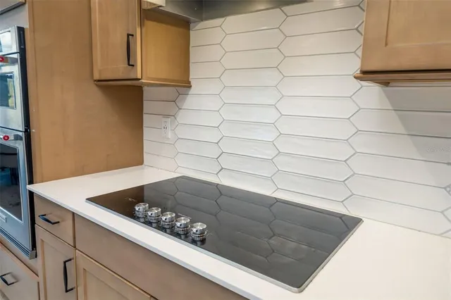 an aerial view of multiple houses with yard