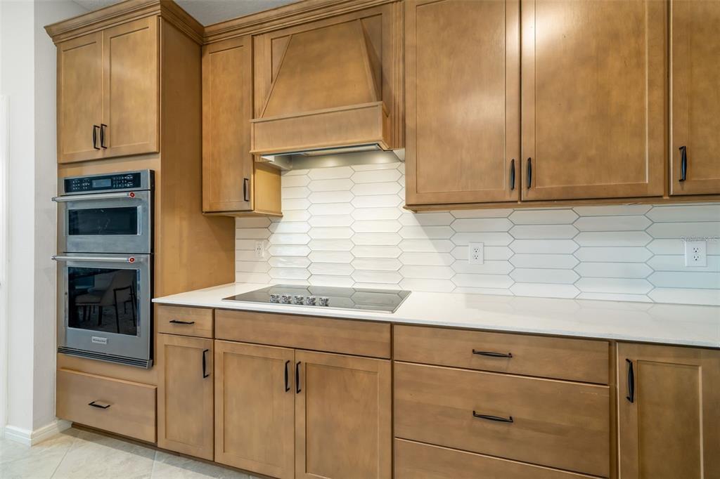 9406 Lamine Way Parrish, FL 34219 - Photo 43 of 74 a kitchen with a sink and cabinets