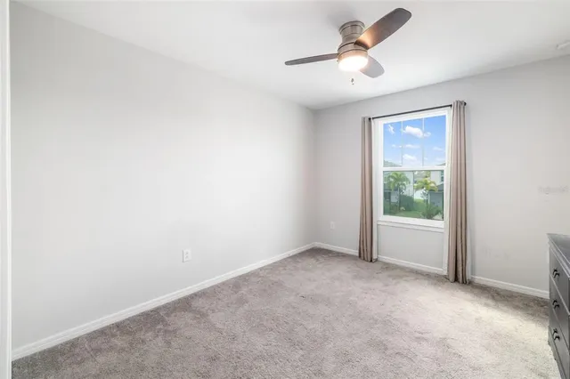 a aerial view of a house with a yard