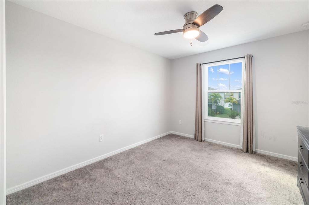 9406 Lamine Way Parrish, FL 34219 - Photo 46 of 74 an empty room with fan and windows