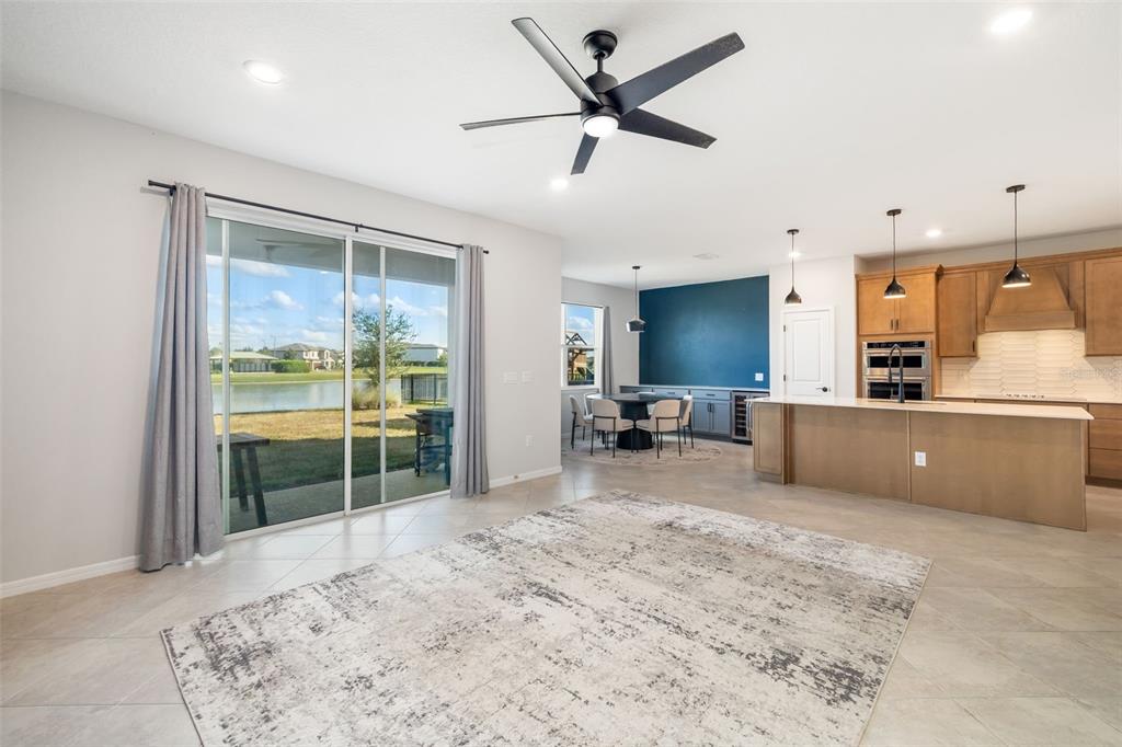 9406 Lamine Way Parrish, FL 34219 - Photo 48 of 74 a bedroom with furniture and a large window