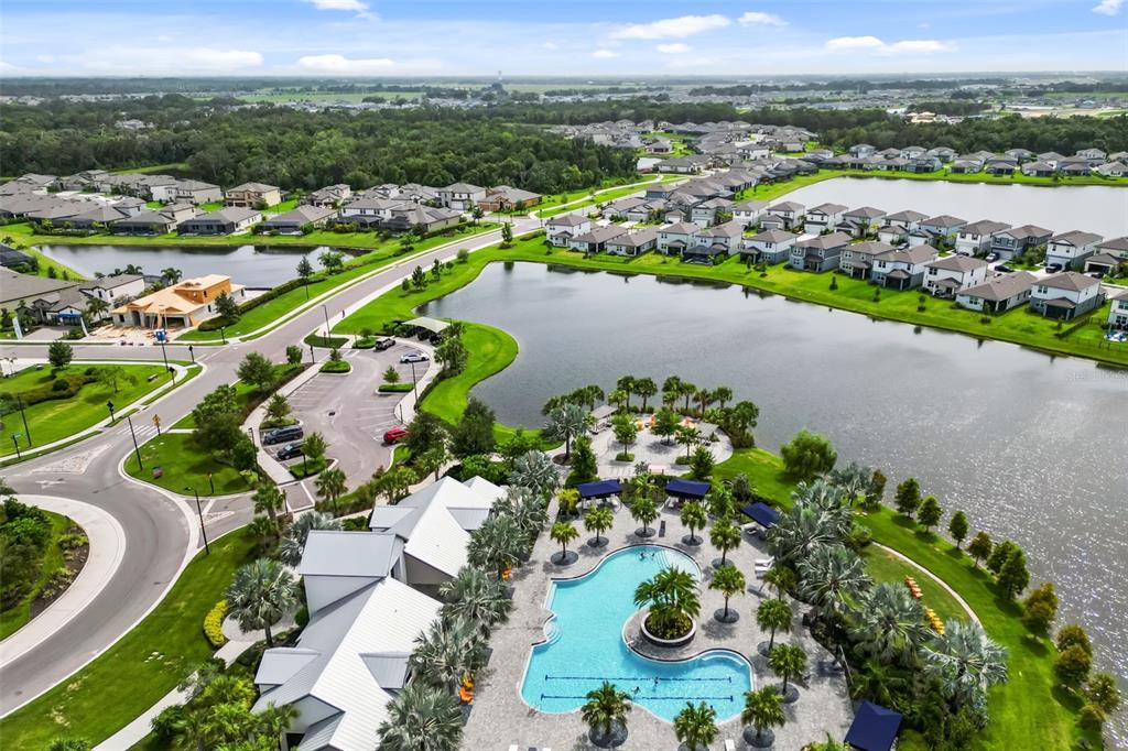 9406 Lamine Way Parrish, FL 34219 - Photo 56 of 74 an aerial view of residential houses with outdoor space