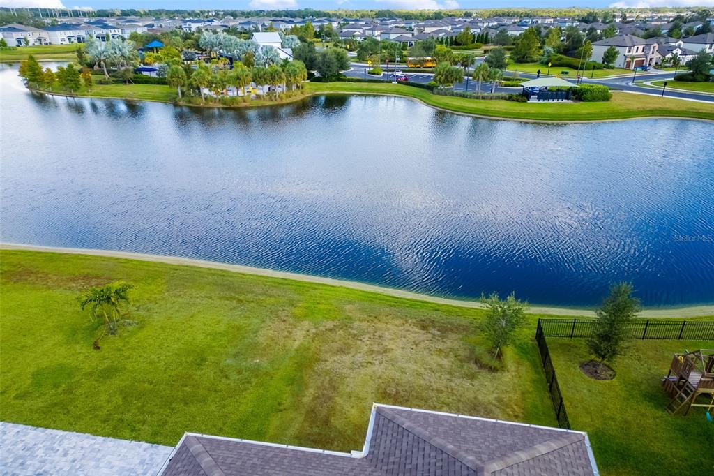 9406 Lamine Way Parrish, FL 34219 - Photo 61 of 74 a view of a lake with a houses