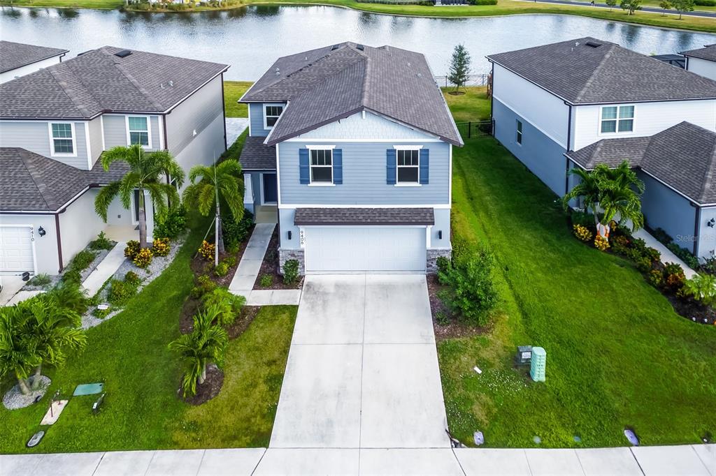 9406 Lamine Way Parrish, FL 34219 - Photo 69 of 74 a aerial view of a house with a yard
