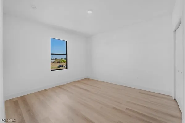 a view of an empty room and window