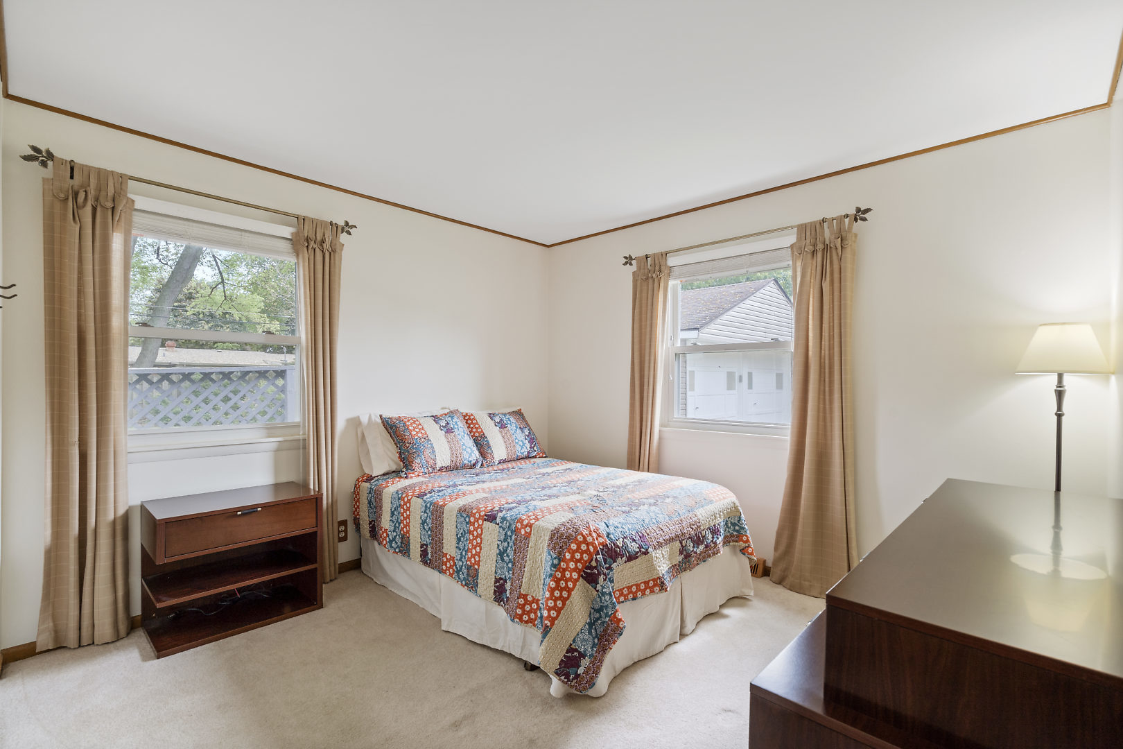 10 Durango Road Montgomery, IL 60538 - Photo 11 of 21 a bedroom with a bed lamp and a window