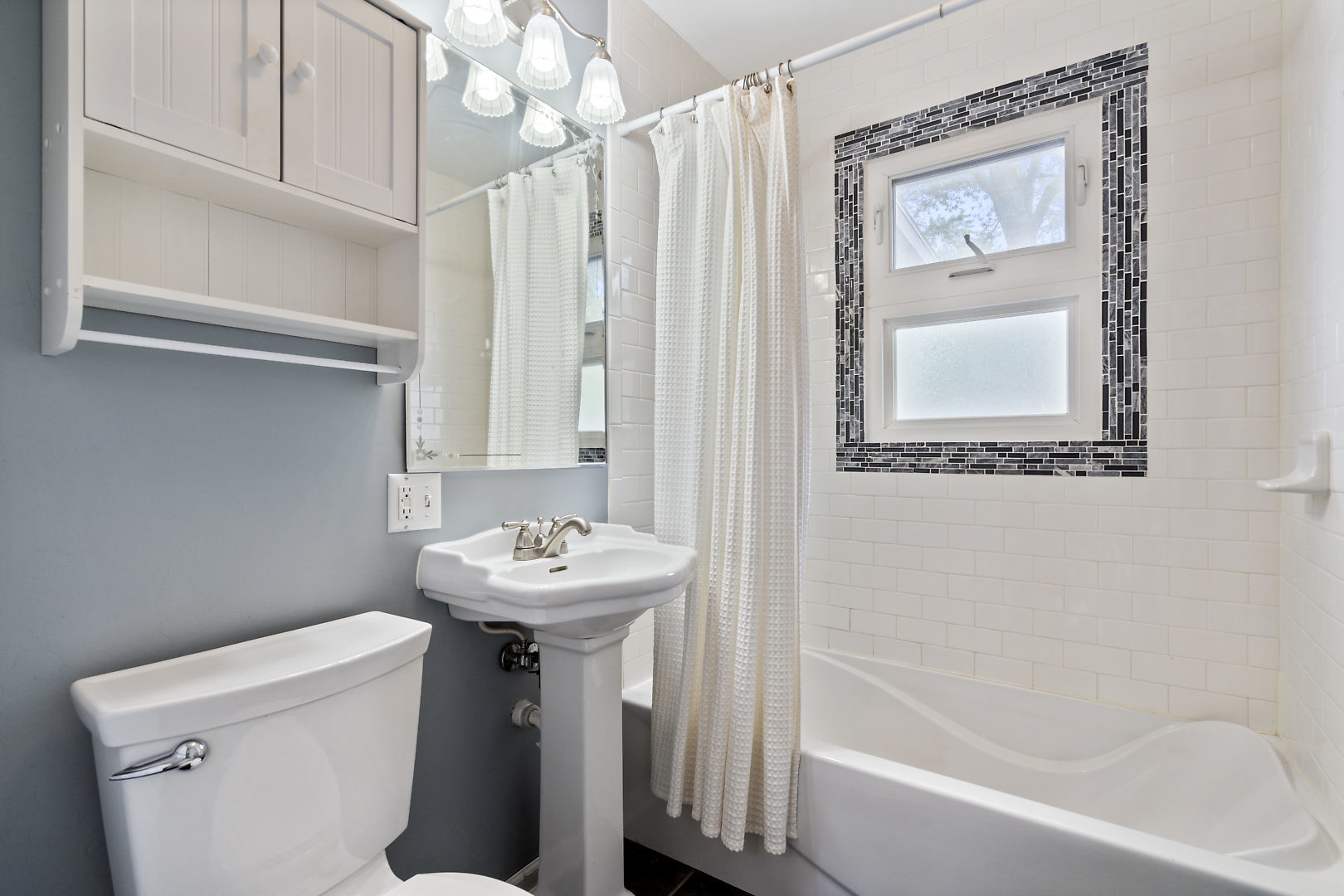 10 Durango Road Montgomery, IL 60538 - Photo 13 of 21 a bathroom with a sink mirror toilet and bathtub