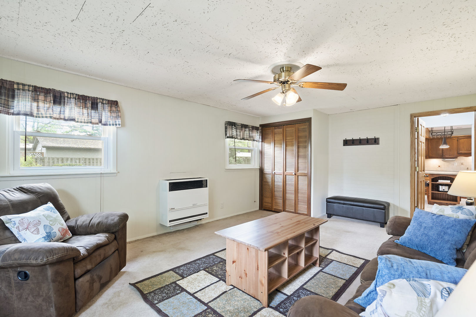 10 Durango Road Montgomery, IL 60538 - Photo 14 of 21 a living room with furniture and a chandelier