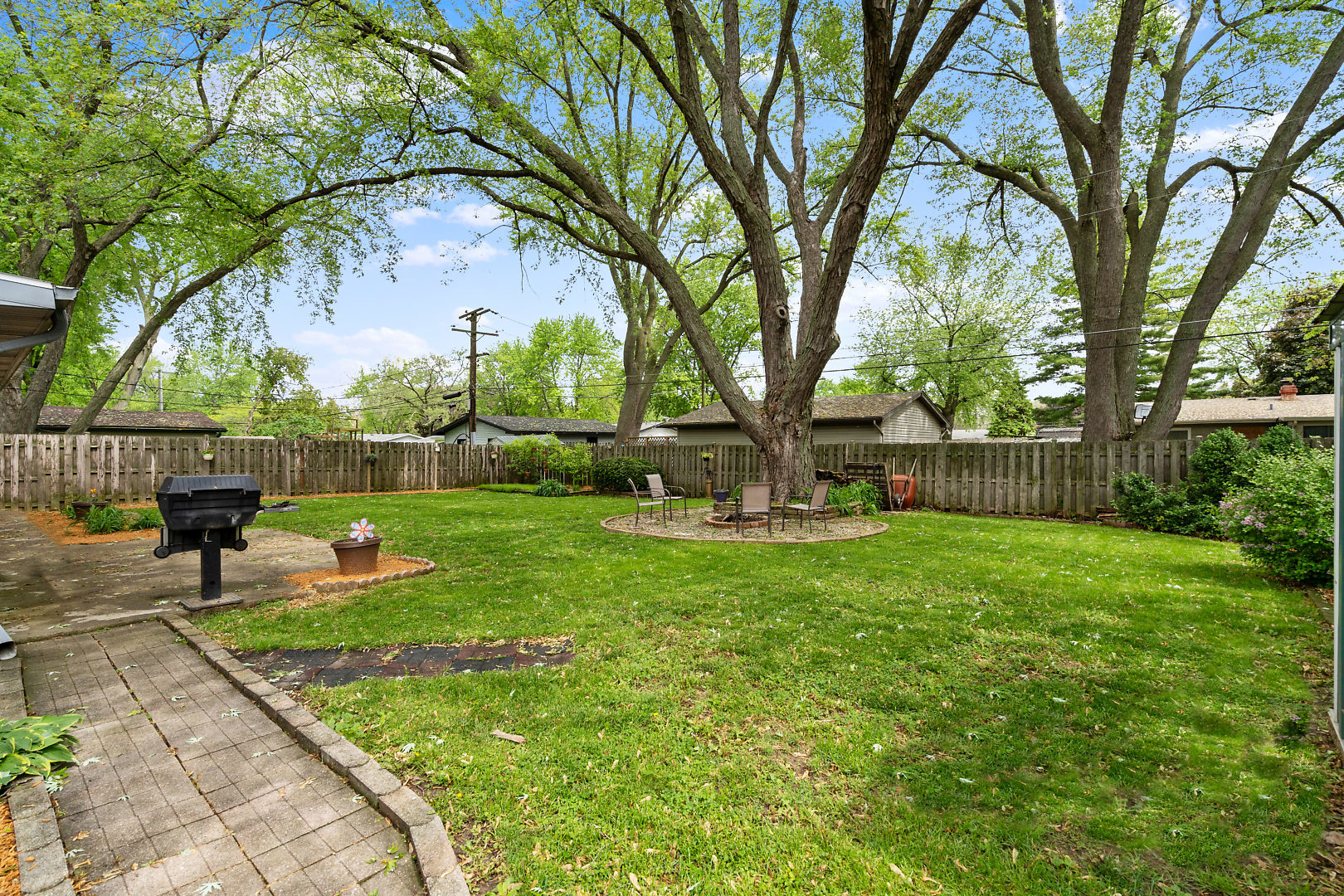 10 Durango Road Montgomery, IL 60538 - Photo 21 of 21 a view of a garden with a bench