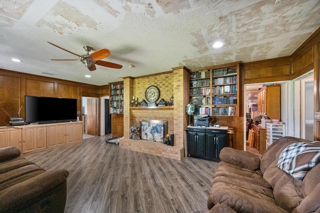 3748 Old Fort Worth Road Midlothian, TX 76065 - Photo 19 of 40 This room is 25'1" x 16'4". Like I said, it's HUGE! Love the built in bookcases too.