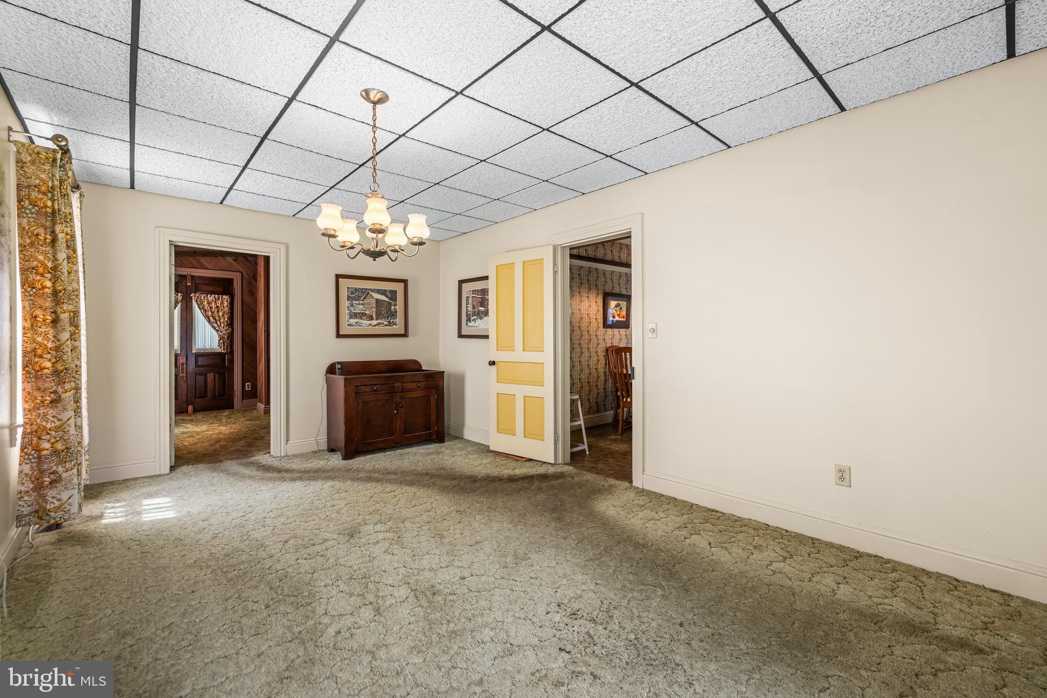 1053 Freeland Road Freeland, MD 21053 - Photo 11 of 31 a big room with chandelier and fireplace
