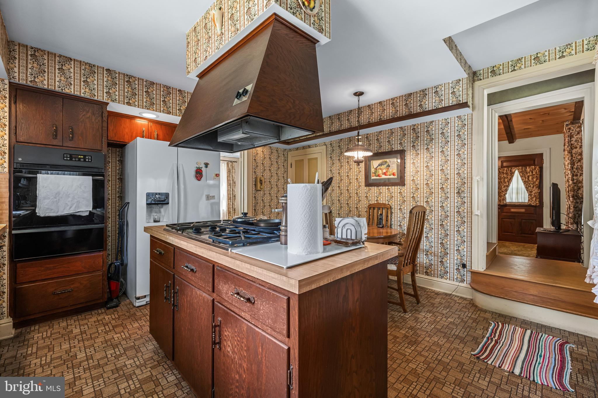 1053 Freeland Road Freeland, MD 21053 - Photo 13 of 31 a kitchen with a stove and a refrigerator