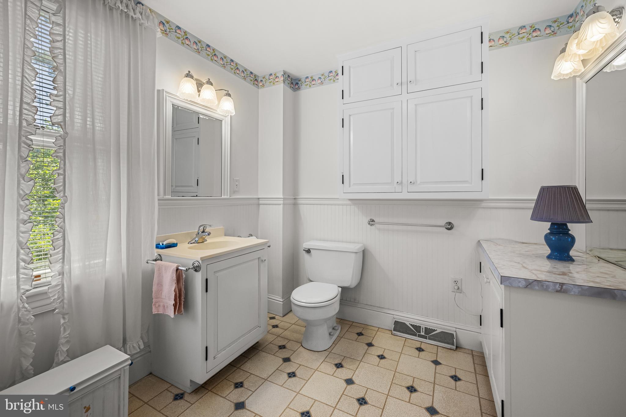 1053 Freeland Road Freeland, MD 21053 - Photo 16 of 31 a bathroom with a sink toilet and shower