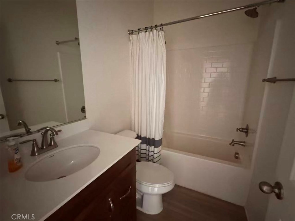15767 Ralph Lane Fontana, CA 92336 - Photo 7 of 13 a bathroom with a sink a toilet and shower