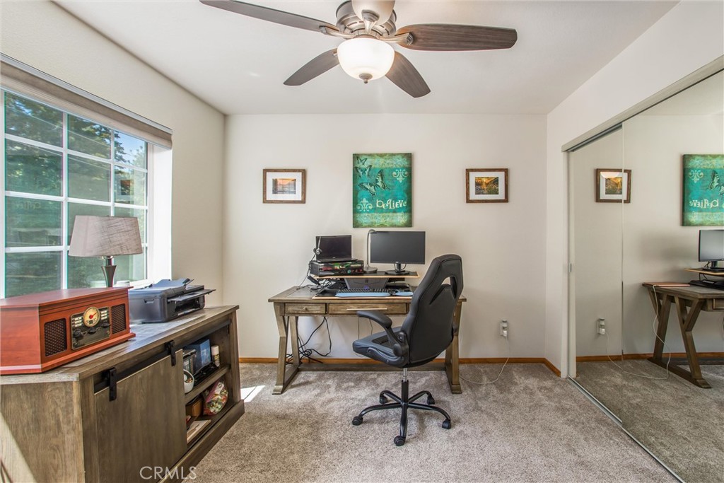 6180 Cedar Avenue Angelus Oaks, CA 92305 - Photo 21 of 31 a view of a workspace with furniture and a window