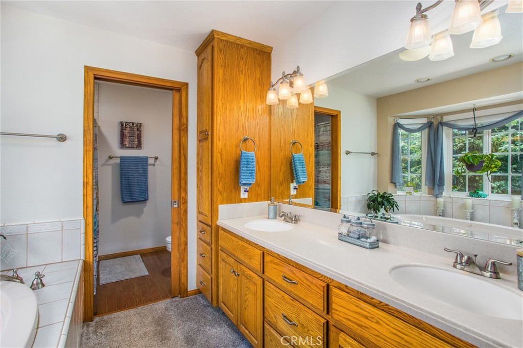 6180 Cedar Avenue Angelus Oaks, CA 92305 - Photo 24 of 31 a bathroom with a sink and a mirror