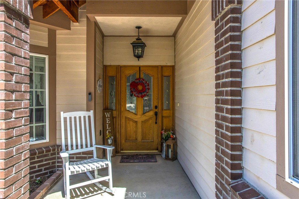 6180 Cedar Avenue Angelus Oaks, CA 92305 - Photo 3 of 31 a view of a door and a balcony