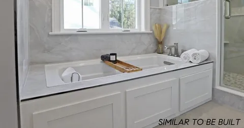 a close view of a sink and a vanity in the bathroom