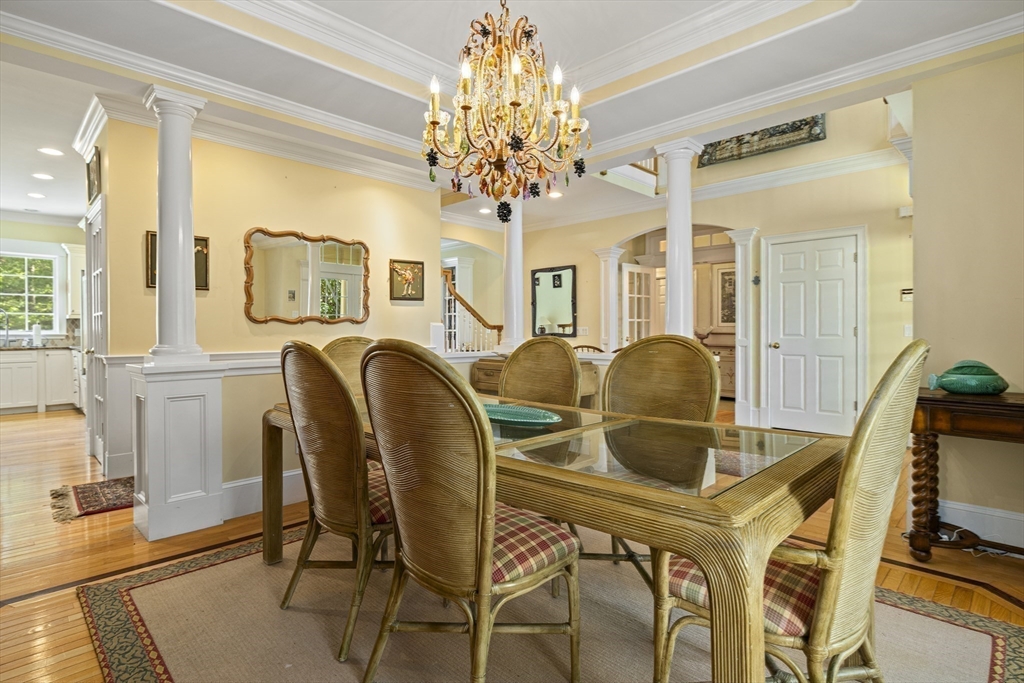 58 The Hacking Circle Mashpee, MA 02649 - Photo 11 of 37 a dining room with furniture and chandelier