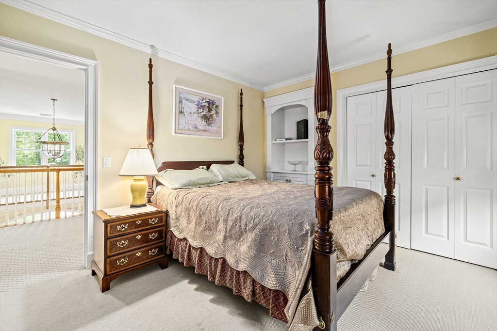 58 The Hacking Circle Mashpee, MA 02649 - Photo 16 of 37 a bedroom with a bed and a window