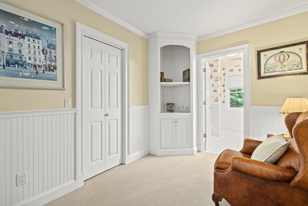 58 The Hacking Circle Mashpee, MA 02649 - Photo 17 of 37 a bedroom with furniture and wooden floor