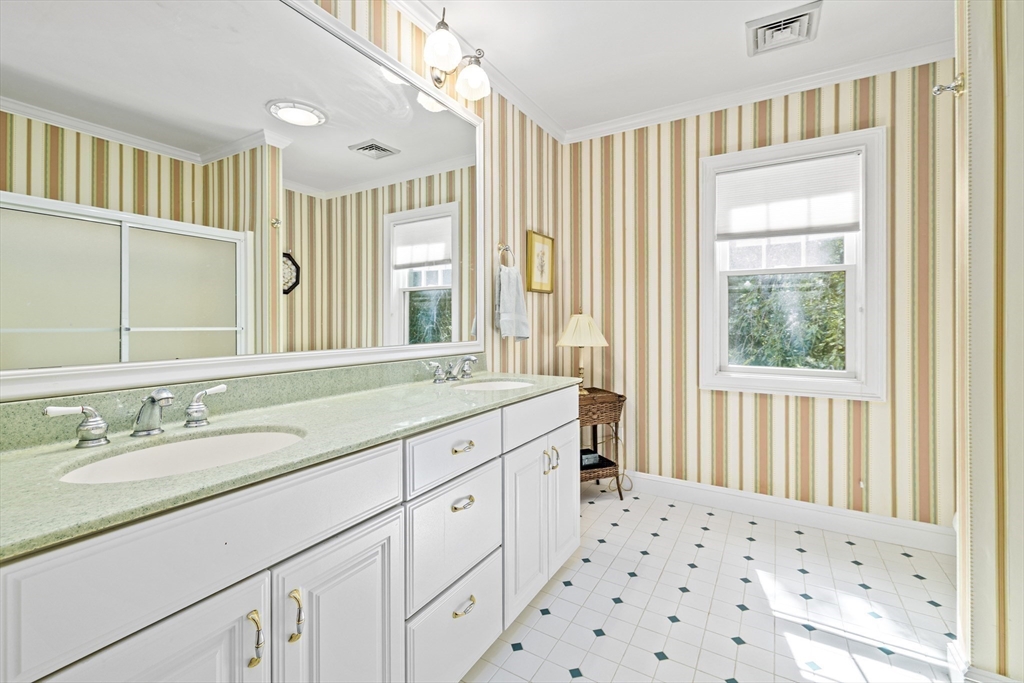 58 The Hacking Circle Mashpee, MA 02649 - Photo 21 of 37 a spacious bathroom with a sink double vanity and a mirror