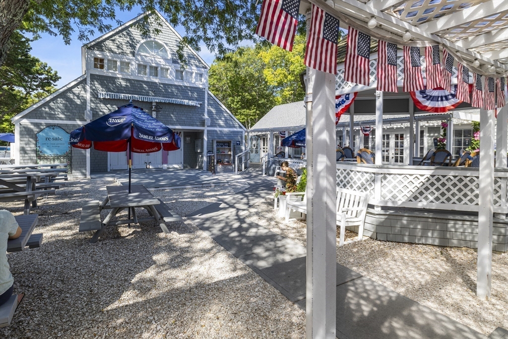 58 The Hacking Circle Mashpee, MA 02649 - Photo 29 of 37 a front view of a house