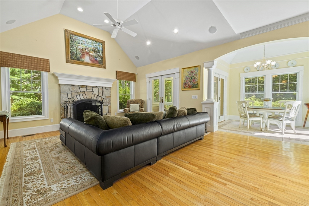 58 The Hacking Circle Mashpee, MA 02649 - Photo 9 of 37 a living room with furniture and a fireplace
