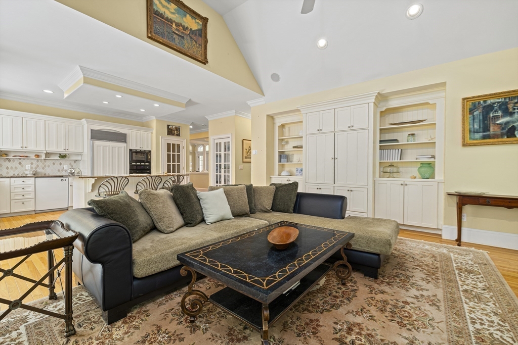 58 The Hacking Circle Mashpee, MA 02649 - Photo 10 of 37 a living room with furniture a rug and kitchen view