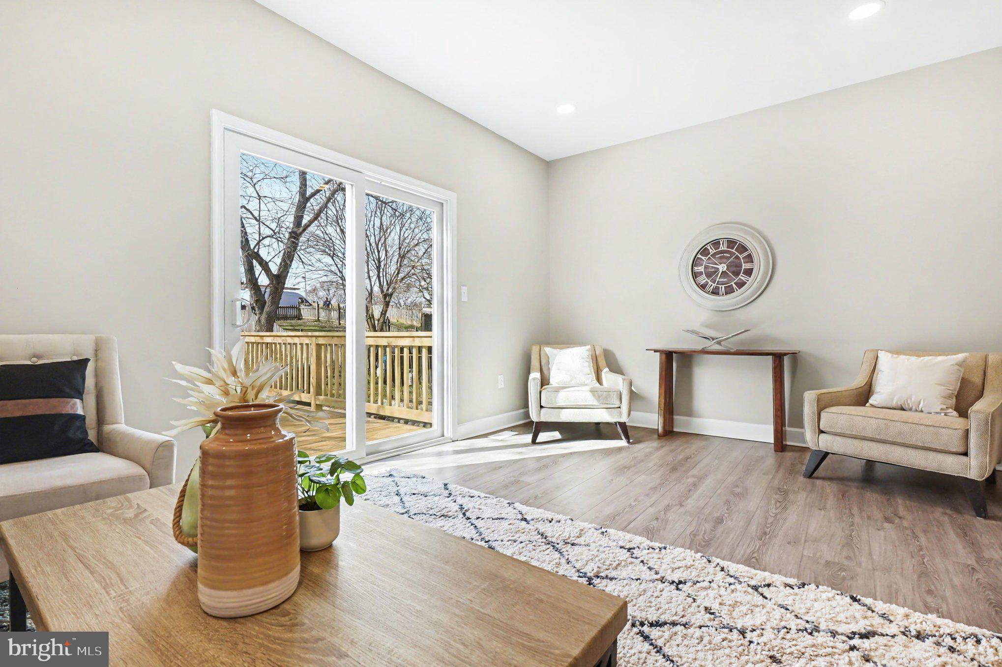 32 Romanoff Court Baltimore, MD 21234 - Photo 11 of 26 a living room with furniture and a table