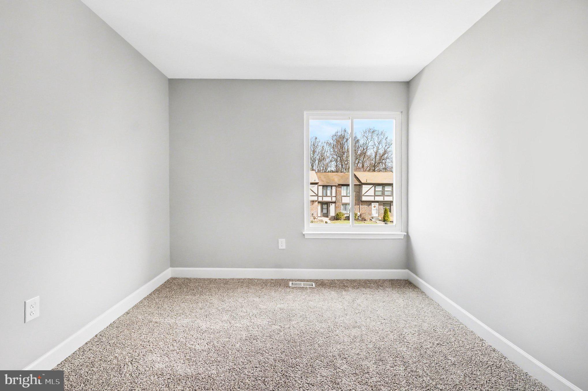 32 Romanoff Court Baltimore, MD 21234 - Photo 18 of 26 an empty room with a window