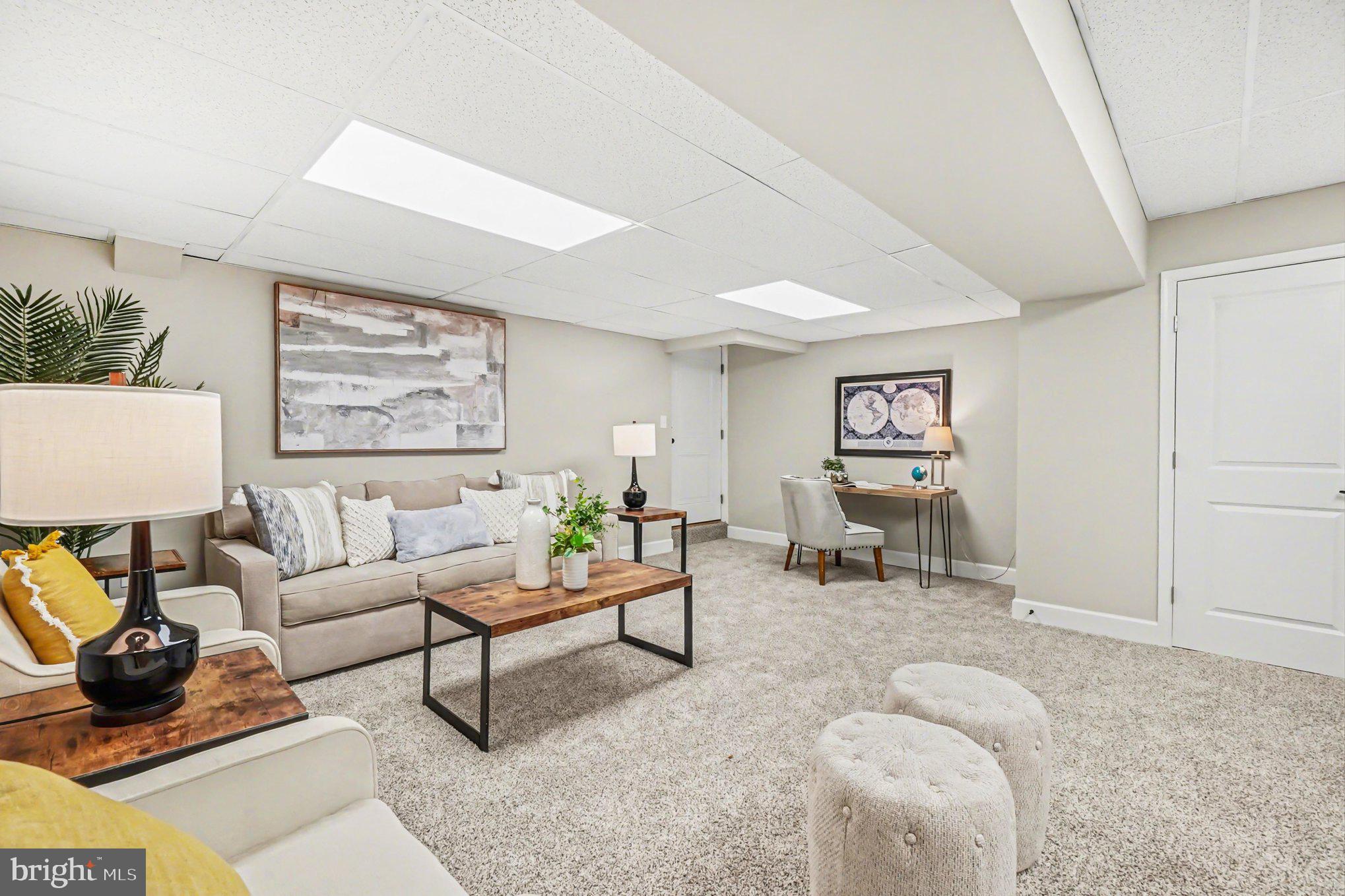 32 Romanoff Court Baltimore, MD 21234 - Photo 21 of 26 a living room with furniture and a table