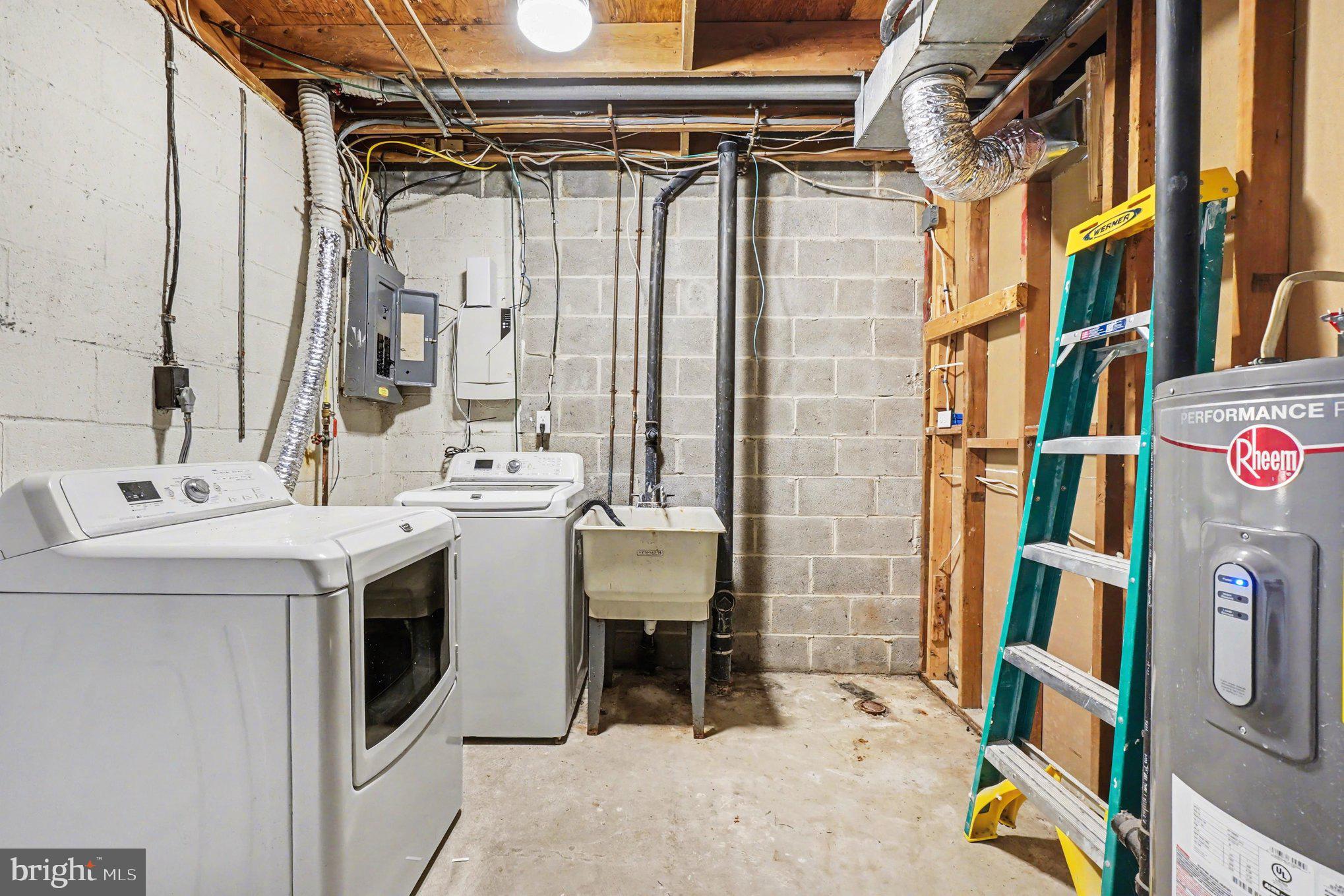 32 Romanoff Court Baltimore, MD 21234 - Photo 25 of 26 a utility room with dryer and washer