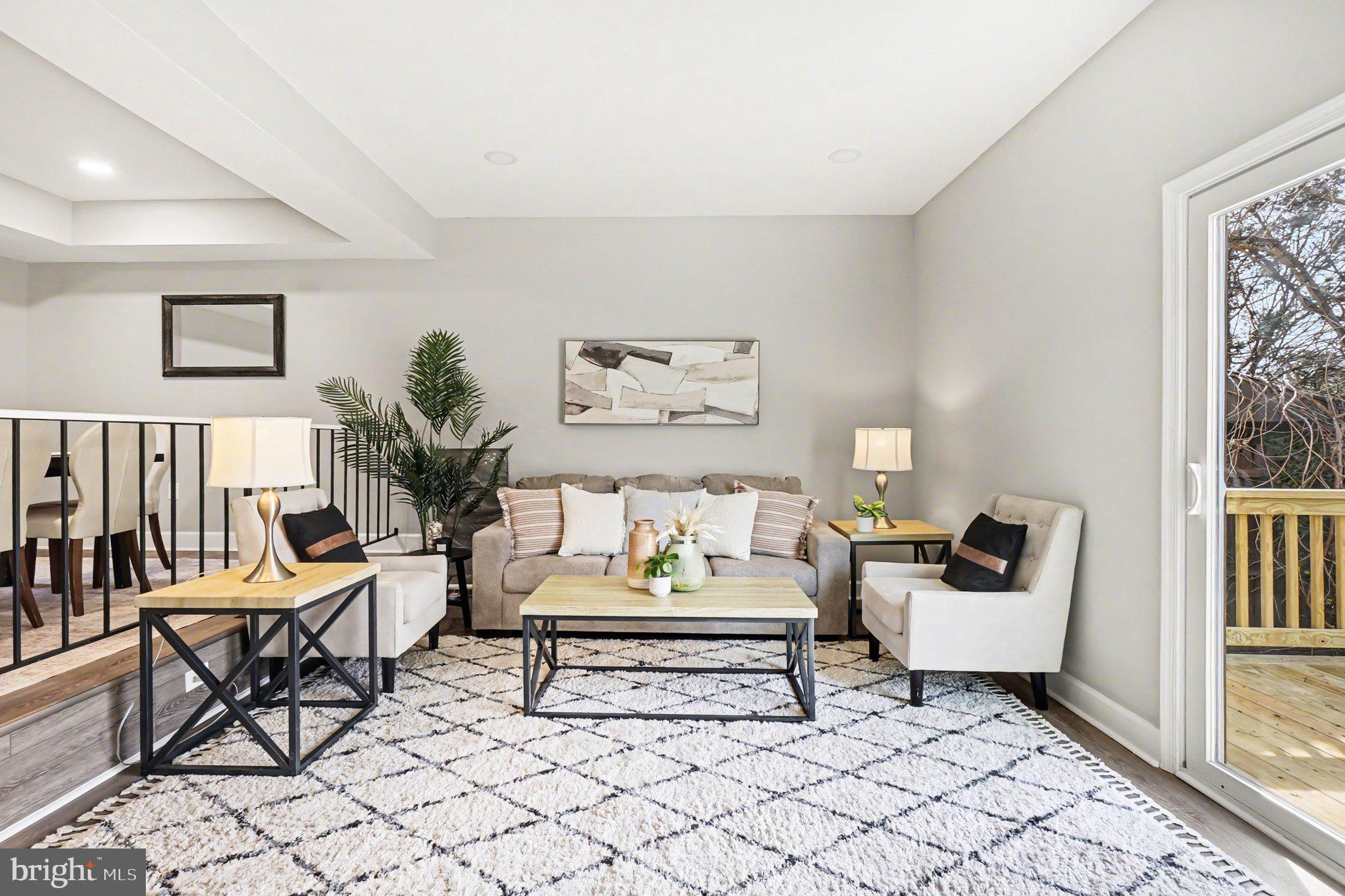 32 Romanoff Court Baltimore, MD 21234 - Photo 7 of 26 a living room with furniture and a potted plant
