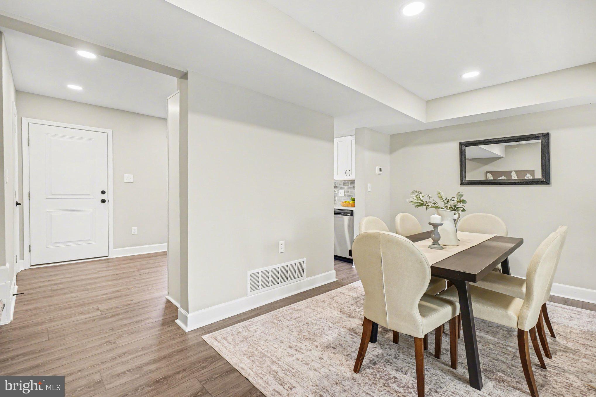 32 Romanoff Court Baltimore, MD 21234 - Photo 10 of 26 a view of a dining room with furniture and wooden floor