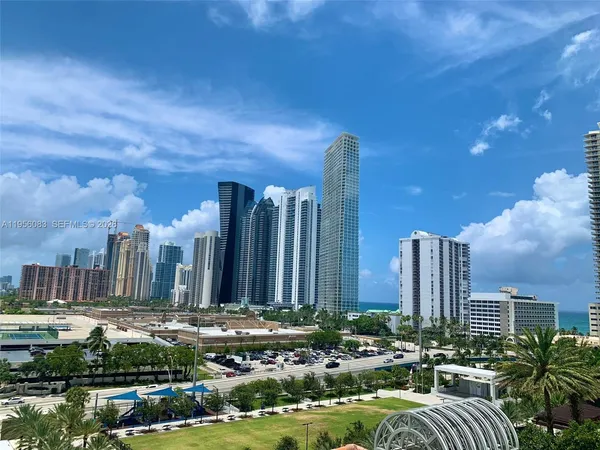 a view of a city with tall buildings