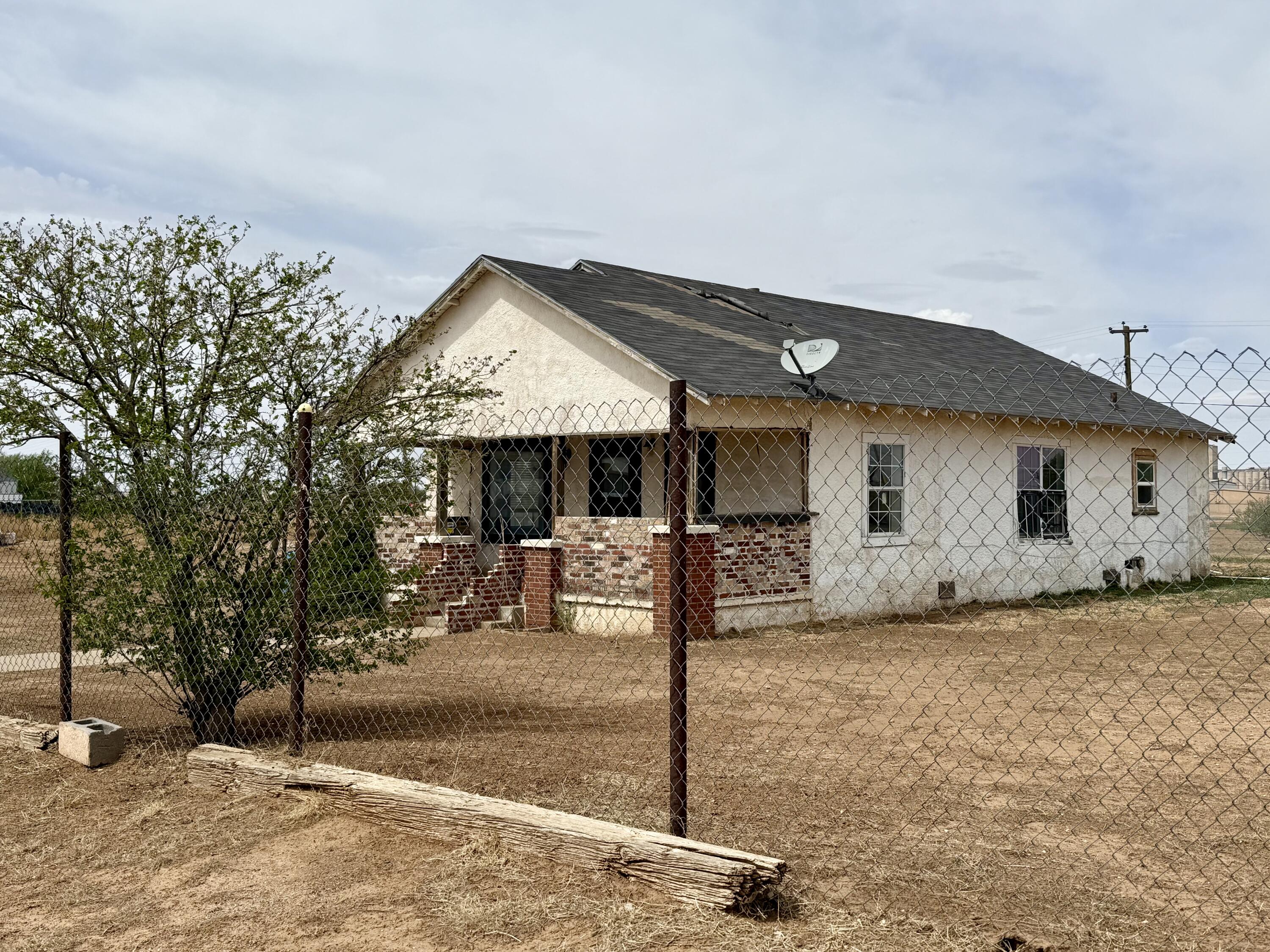 2833 East 53rd Street Lubbock, TX 79404 - Photo 1 of 30 a front view of a house with a yard