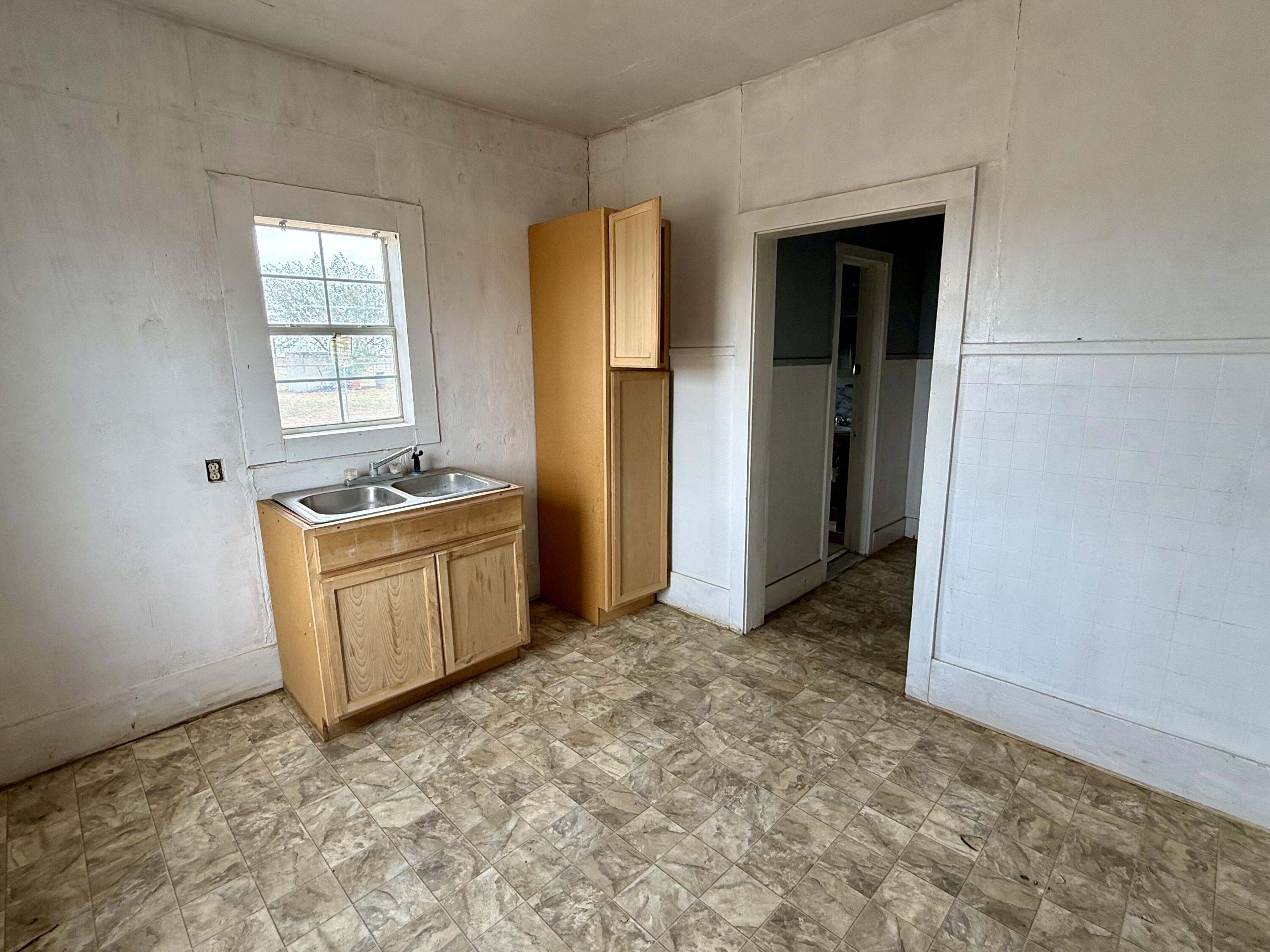 2833 East 53rd Street Lubbock, TX 79404 - Photo 11 of 30 a view of a storage & utility room with windows