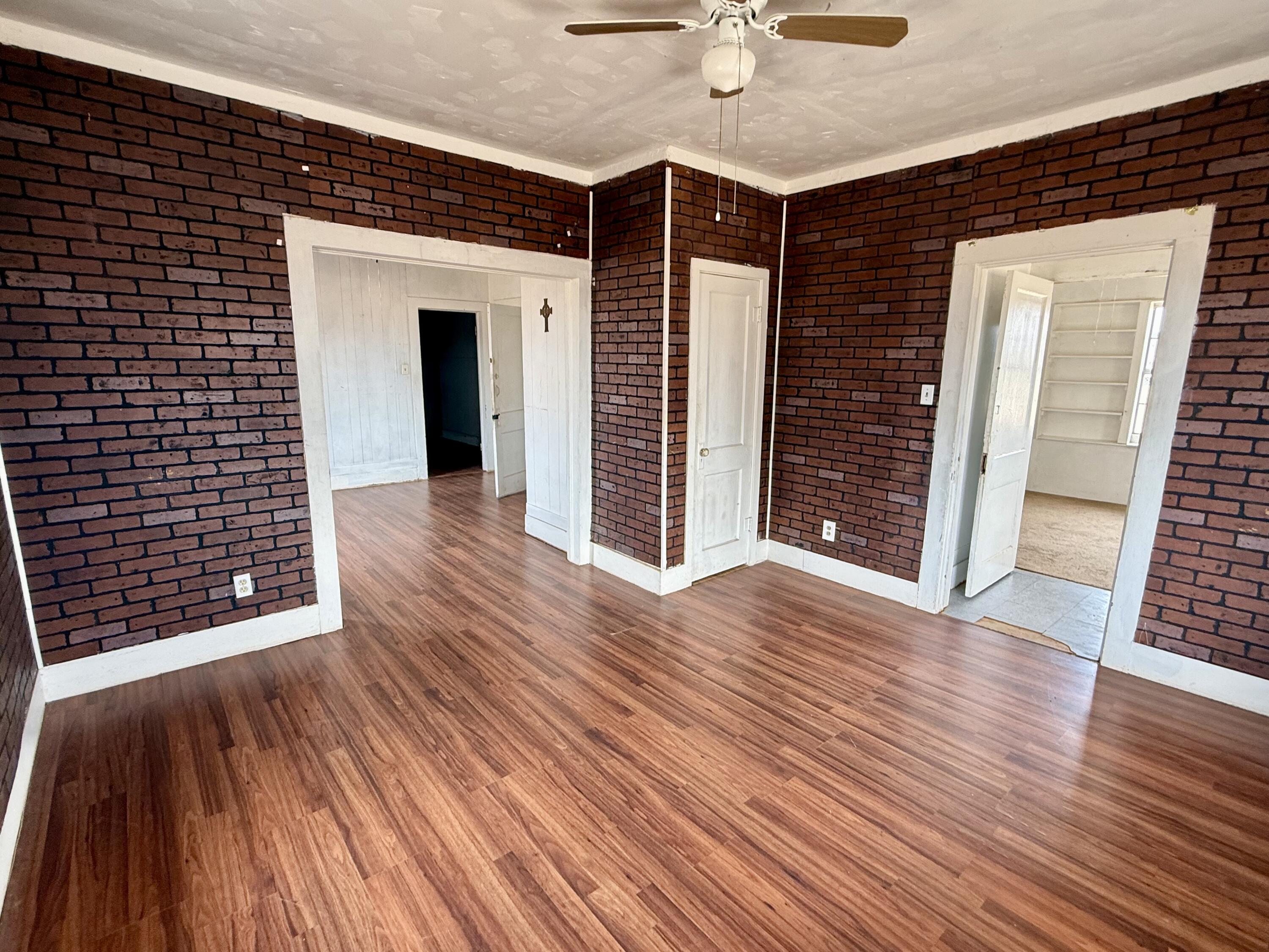 2833 East 53rd Street Lubbock, TX 79404 - Photo 16 of 30 a view of a livingroom with wooden floor