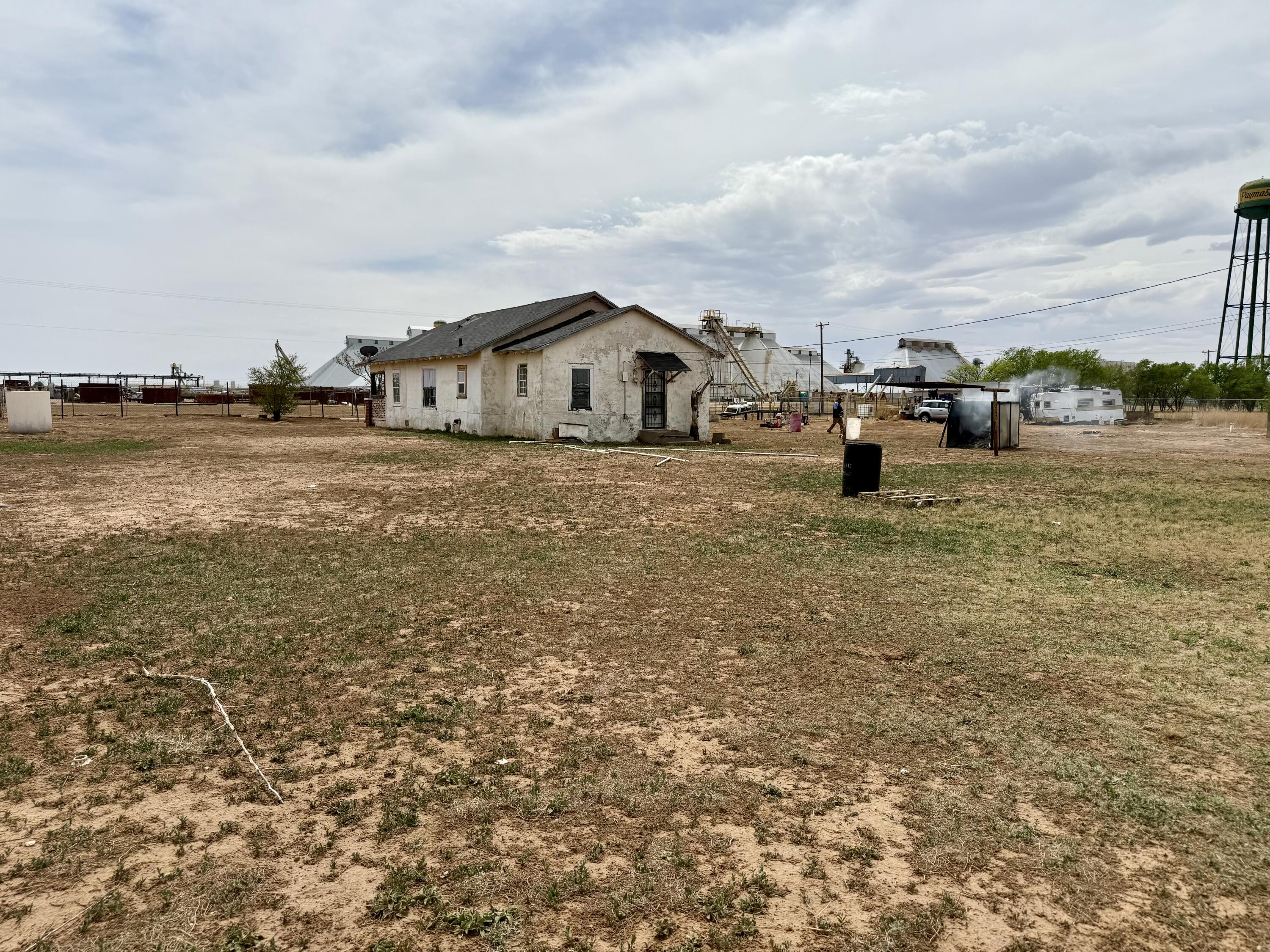 2833 East 53rd Street Lubbock, TX 79404 - Photo 19 of 30 a tall house with a big yard and large trees