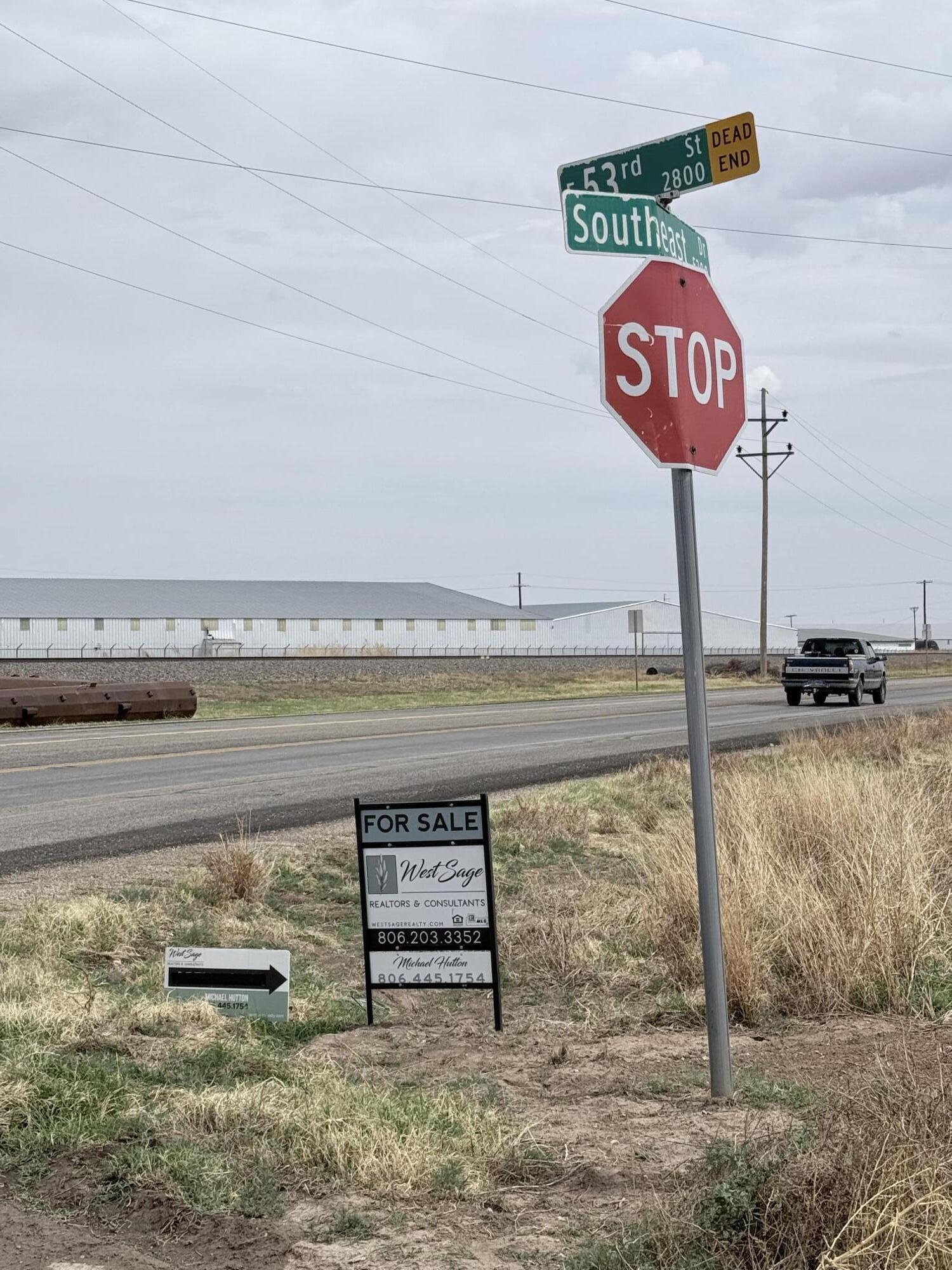 2833 East 53rd Street Lubbock, TX 79404 - Photo 30 of 30 a view of a lake with a nearby beach