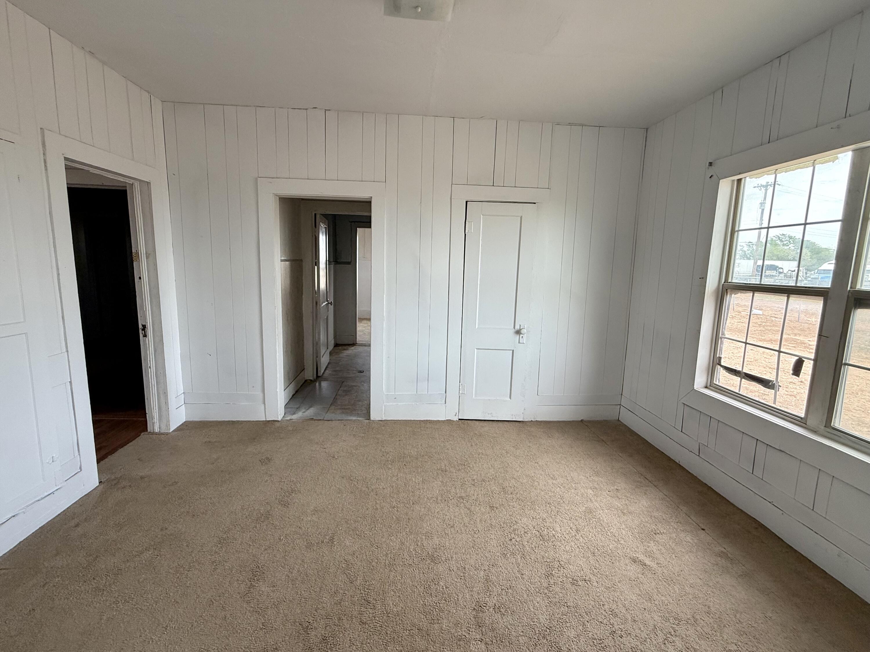 2833 East 53rd Street Lubbock, TX 79404 - Photo 8 of 30 a view of an empty room with a window