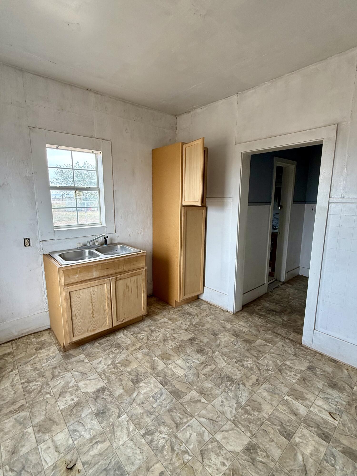 2833 East 53rd Street Lubbock, TX 79404 - Photo 10 of 30 a view of a room with a sink