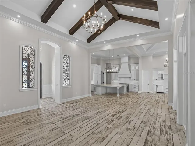 a bathroom with a toilet a sink a vanity and mirror