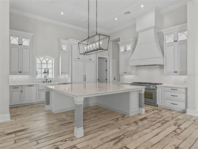 a spacious bathroom with a double vanity sink mirror and double