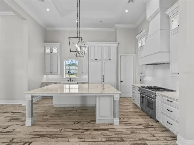 a spacious bathroom with a bathtub and a sink