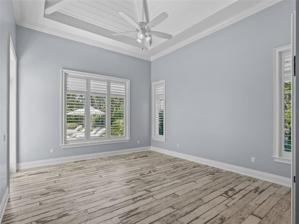 8746 Northwest 31st Lane Road Ocala, FL 34482 - Photo 31 of 89 wooden floor in an empty room with a window