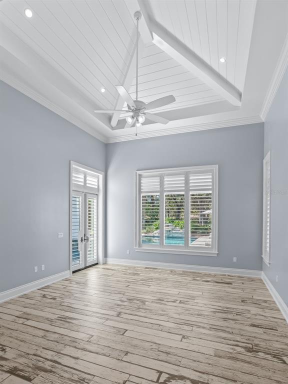 8746 Northwest 31st Lane Road Ocala, FL 34482 - Photo 33 of 89 wooden floor in an empty room with a window