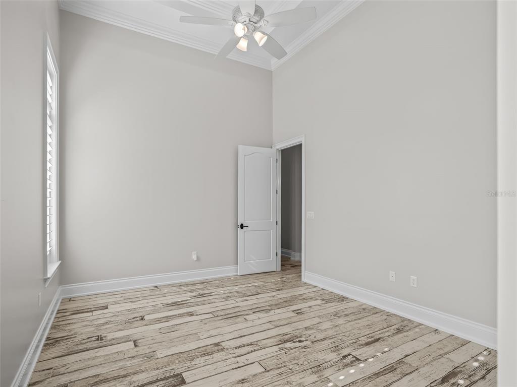 8746 Northwest 31st Lane Road Ocala, FL 34482 - Photo 44 of 89 wooden floor in an empty room