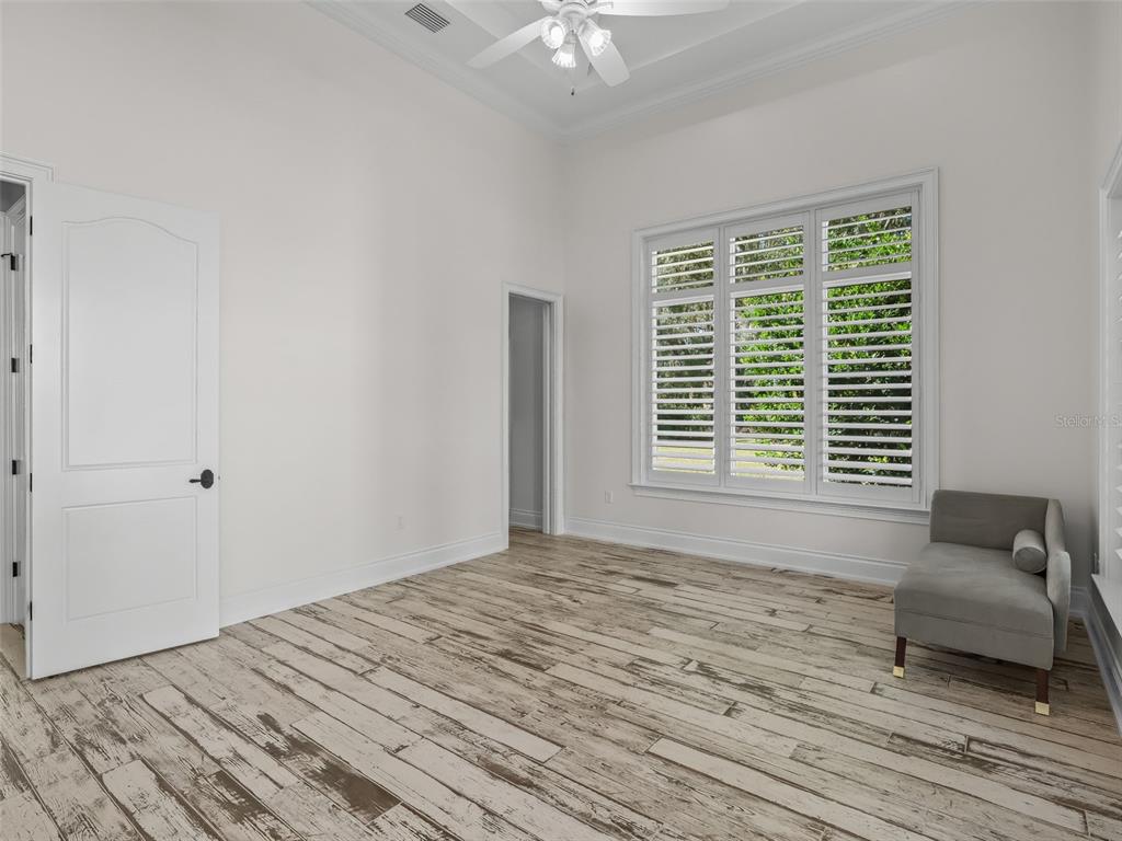 8746 Northwest 31st Lane Road Ocala, FL 34482 - Photo 58 of 89 a bedroom with a bed and a window